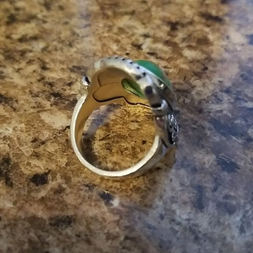 Inlaid turquoise egg shape carved ring size 8
